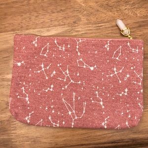 Ipsy makeup bag, 3 scrunchies, a hair donut!